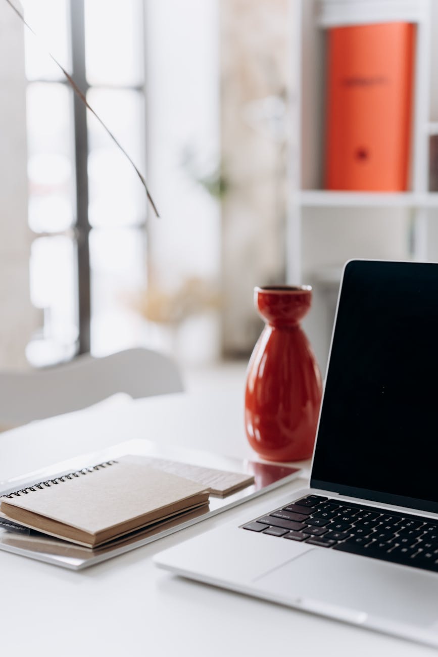 icon of a person sitting at a desk